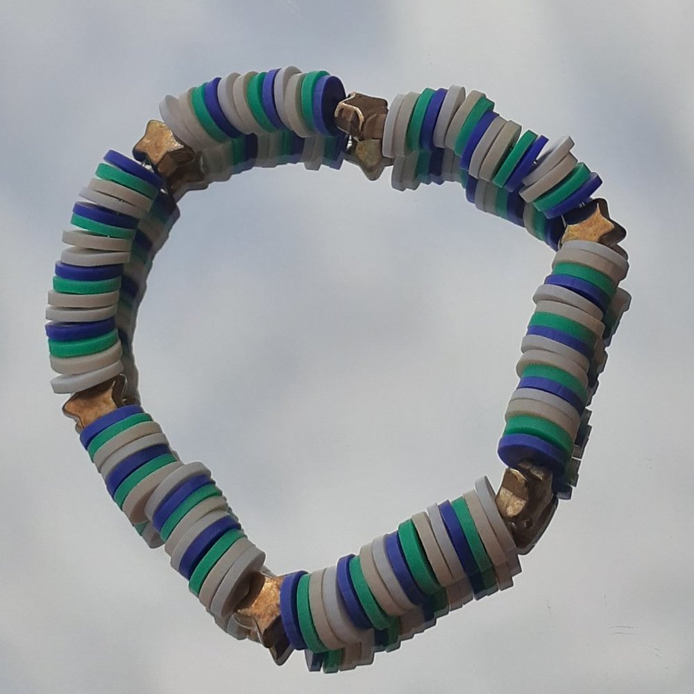Play bead stretchy string bracelet When you buy 2 you get 1 free bracelet!